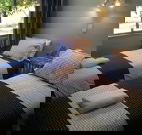 Tin Shack - Darwin Holiday