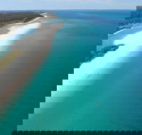 Fraser Island West Coast BBQ Lunch Cruise from Hervey Bay Including Kayaking and Swimming - Darwin Holiday