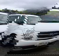 IMAX Private Transfer 7 Guests Cairns Airport to Hotels in Cairns City - Darwin Holiday