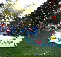 Community Christmas Party and Carols by Candlelight - Darwin Holiday