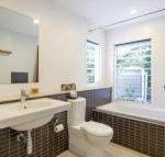 Whispering Trees - Darwin Holiday