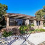 A Reflection On The Lake - Darwin Holiday 0