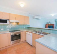 Beachside 22 LJHooker Yamba - Darwin Holiday