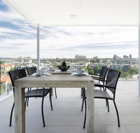 Minimalist Penthouse Condo with Skyline Vistas - Darwin Holiday