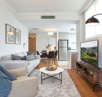 Tidy Apartment with Balcony and Parking Near Trains