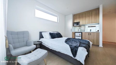 Queen Bed Stylish Suite With TV - Room 12 - Darwin Holiday 2