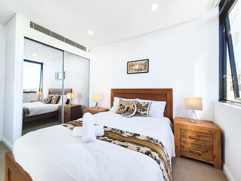 Relaxing 1BR W Pools & SPA, Gym In Olympic Park - Darwin Holiday 0