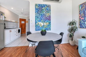 Watch the Sun set over Cullen Bay Marina and Harbour